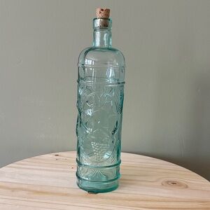 Aqua Embossed Glass Bottle with Grape Motif